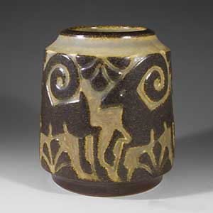 michael andersen cylindrical vase in brown and tan, featuring a  stag figure circling the vase