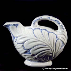 michael andersen and son blue and white floral design jug with a poring spout and a handle