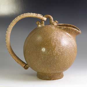 arne bang pitcher with a wicker handle marked 151