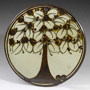 Wall plate with a decorative tree by Erling & Karin Heerwagen