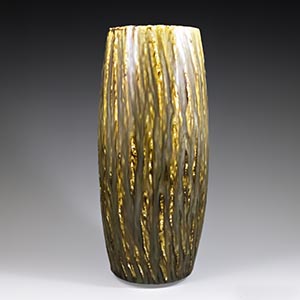 Gunnar Nylund for Rorstrand,Rubus 6 vase with a running glaze in brown and ochre.