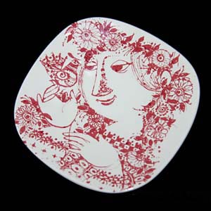 wiinblad plate in red and white featuring a woman holding a bird